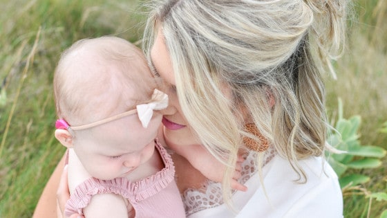 My Biggest Surprise as a New Mom Mother and infant daughter snuggling outside